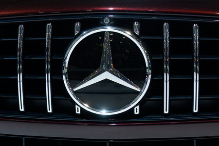 Toronto, ON, Canada - March 15, 2025: A Mercedes-Benz emblem is displayed on the grille of a black luxury car during the Canadian International Auto Show 2025.のeditorial素材