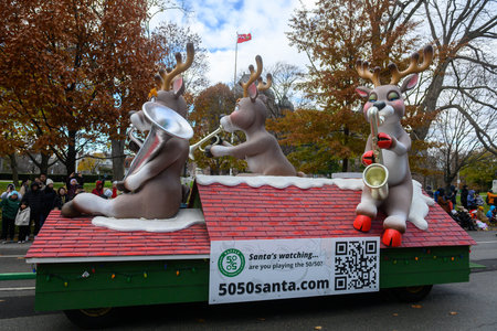 Toronto, ON, Canada â€“ November 23, 2025:  People take part in the 121st Original Santa Claus...