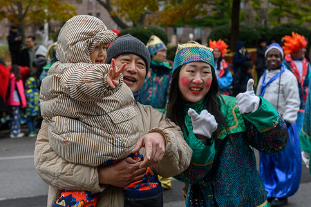 Toronto, ON, Canada â November 23, 2025:  People take part in the 121st Original Santa Claus Parade in Downtown Toronto.のeditorial素材