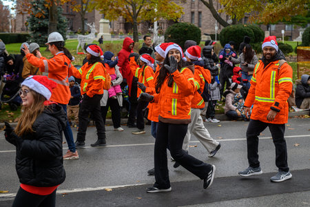 Toronto, ON, Canada â November 23, 2025:  People take part in the 121st Original Santa Claus Parade in Downtown Toronto.のeditorial素材