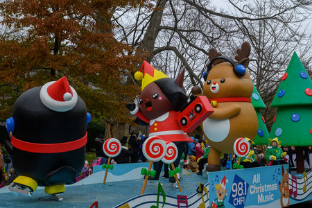 Toronto, ON, Canada â November 23, 2025:  People take part in the 121st Original Santa Claus Parade in Downtown Toronto.のeditorial素材
