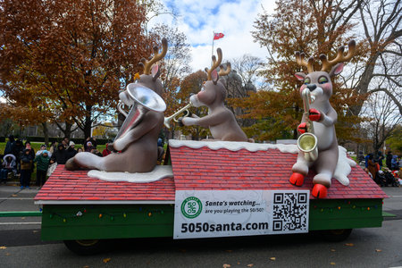Toronto, ON, Canada â November 23, 2025:  People take part in the 121st Original Santa Claus Parade in Downtown Toronto.のeditorial素材