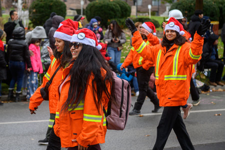 Toronto, ON, Canada â November 23, 2025:  People take part in the 121st Original Santa Claus Parade in Downtown Toronto.のeditorial素材