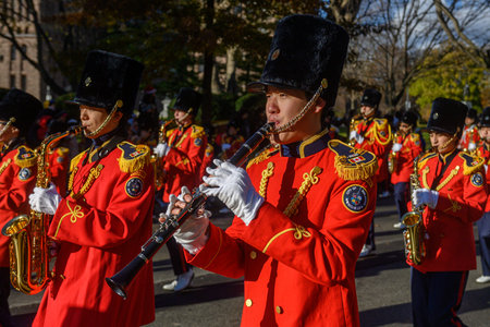TORONTO, ONTARIO, CANADA - NOVEMBER 23, 2025: The full contingent of a marching band in spectacular...