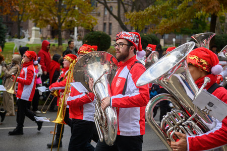 Toronto, ON, Canada â November 23, 2025:  People take part in the 121st Original Santa Claus Parade in Downtown Toronto.のeditorial素材