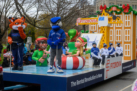 Toronto, ON, Canada â€“ November 23, 2025:  People take part in the 121st Original Santa Claus...