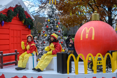 TORONTO, ONTARIO, CANADA - NOVEMBER 23, 2025: A float sponsored by McDonald's, featuring children in...