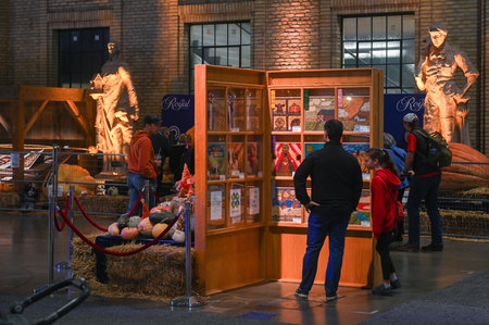 Toronto, ON, Canada - November 14, 2025: People attending The Royal Agricultural Winter Fair, appreciating various craft exhibits and textile arts on display at the eventのeditorial素材
