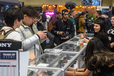 Toronto, ON, Canada - November 6, 2025: Visitors engaging with exhibitors and trying out...