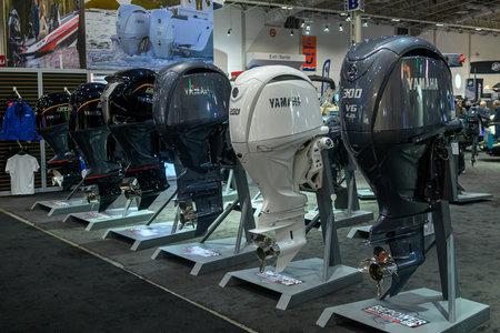 Toronto, ON, Canada - January 20, 2026: Row of Yamaha outboard motors on display at a boat show,...