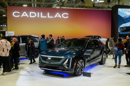 Toronto, ON, Canada - February 14, 2026: Cadillac Lyriq electric SUV showcased at the Canadian International AutoShow with visitors exploring luxury EV technology and design innovationsのeditorial素材
