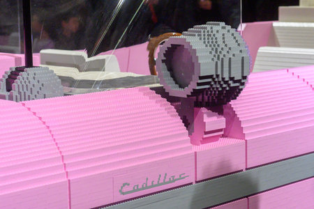 Toronto, ON, Canada - February 14, 2026: Detailed Lego brick model of a pink Cadillac car on display, showcasing creativity and popular culture at an auto showのeditorial素材
