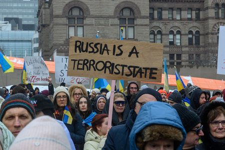 Toronto, ON, Canada â€“ February 22, 2026: Crowds rallying against Russia's full-scale invasion...