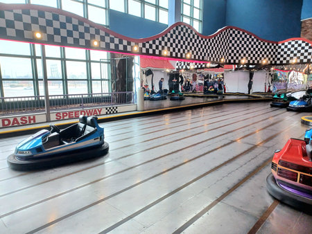 Toronto, ON, Canada - February 26, 2026: The picture shows bumper cars on a track in an indoor amusement park, Fantasy Fair.