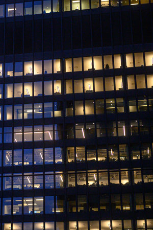 Toronto, ON, Canada - November 11, 2025: Office building is captured at night, showing office...