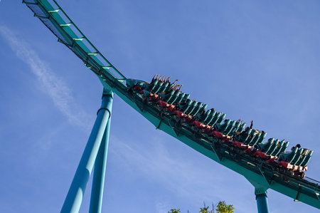 Toronto, ON, Canada - September 30, 2025: Rollercoaster car is filled with people who have raised their hands up in Wonderland Canada.のeditorial素材