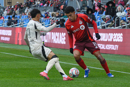 Toronto, ON, Canada - March 14, 2026: Emilio AristizÃ¡bal #17 of Toronto FC and Jorge Ruvalcaba...