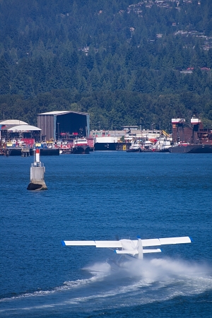 Seaplane taking off over the water 