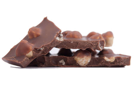 Dark chocolate with nuts isolated on white