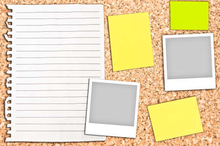 Cork board with empty white page and notes