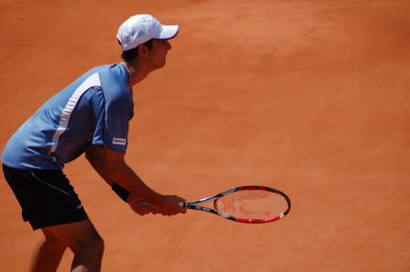 PARIS, FRANCE - MAY 2008: Thomaz Bellucci from Brazil waits for a service from Rafael Nadal during their first round match at the French Open in Roland Garros on May 28, 2008 in Paris. Rafael NADAL (Spa) beat Thomaz Bellucci (Bra) 7-5 6-3 6-1のeditorial素材