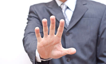 Businessman expressing refusal with open handの写真素材