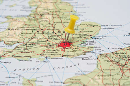 Push pin pointing at London, Englandの写真素材