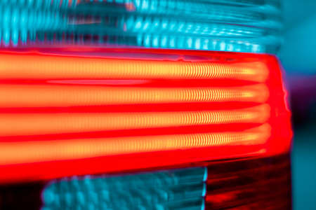 Close-up photo of ncluded red headlight auto.の写真素材