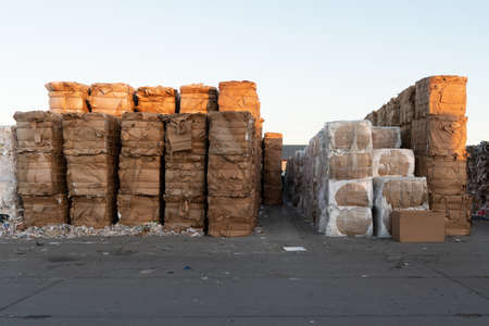 Photo of a large amount of garbage and rubbish at the dump in the street under the sky. High quality photoの写真素材