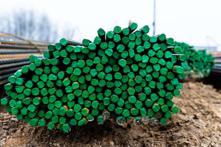 green reinforcement at a construction site close-up.の写真素材