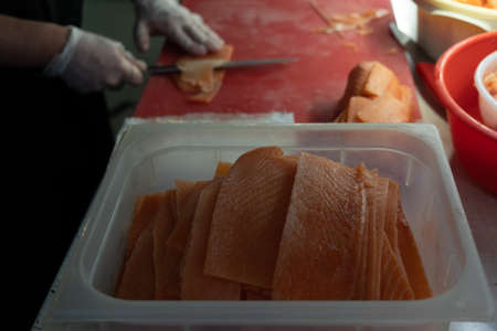 red fish close-up on the background the chef prepares seafood