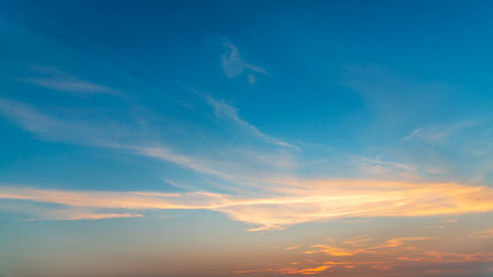 Sunset sky background with tiny clouds,sunset sky background.の写真素材