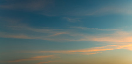 Sunset sky abstract background, blue sky background with tiny clouds, blue sky backgroundの写真素材