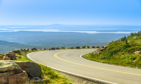 Cadillac Mountain drive in Acadia National Park, Maine in a clear summer day  A ponoramic view of distant lakes and hills の写真素材