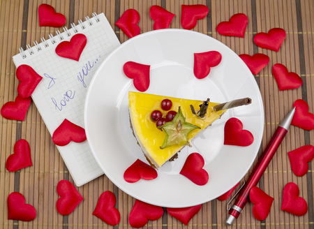 cake and red hearts written love confessionの写真素材