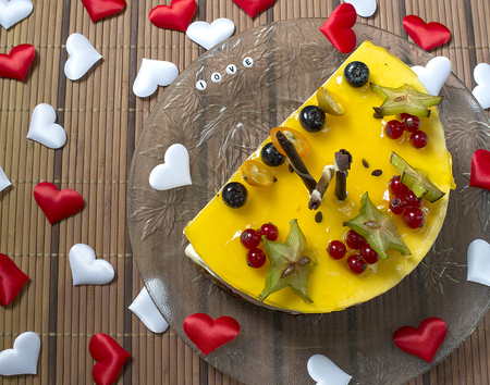 Valentine's cheesecake with berries and the heartsの写真素材