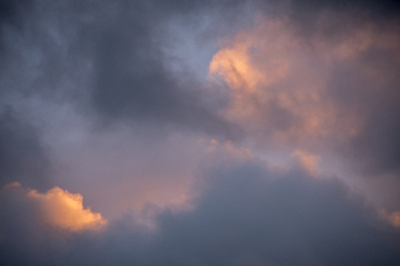 Gray blue lavender peach sky and cloudsの写真素材