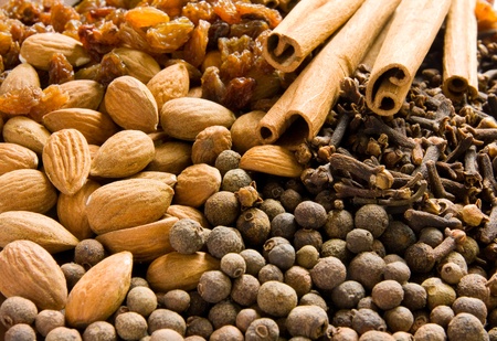 Cinnamon sticks, raisins, almonds, pimento and cloves の写真素材
