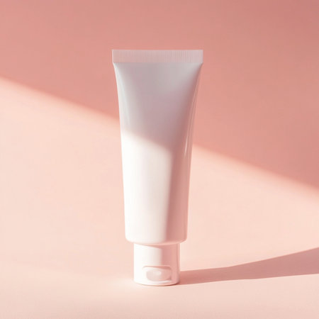 A cosmetic cream tube placed on a soft, delicate background with empty space for text or branding. Ideal for skincare product mockups, packaging presentations, or advertising design. This image represents clean beauty, minimal aesthetics, and a modern promotional styleの写真素材