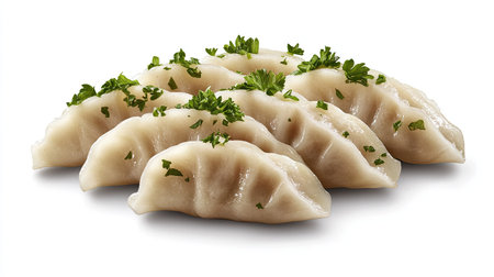 A visually appealing arrangement of freshly made dumplings, garnished with herbs, showcasing delicious and savory flavors perfect for any meal or snacks.の素材