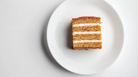 A detailed top view of a traditional Russian honey cake, Medovik, with tender sour cream layers, served on a white plate, isolated on a clean background, emphasizing its golden layers.の素材