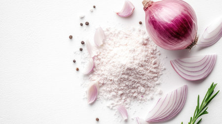 A fresh arrangement of flour, onion slices, and spices on a clean white background. Perfect for food preparation and culinary presentations.の素材
