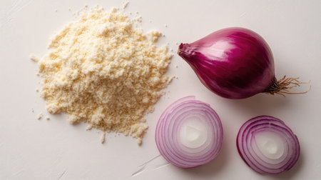 Fresh, vibrant onions with sliced sections and krapee on a white surface, ideal for culinary presentations and food photography showcasing natural ingredients.の素材