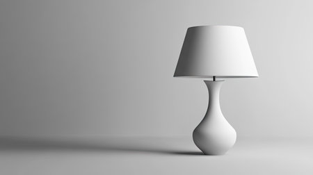 A tapered lamp shade on a simple background, creating space for copy or labels.の素材