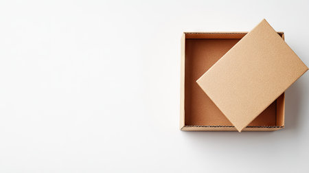 A fresh perspective on an open cardboard box, showcasing a minimalistic design. Ideal for themes related to packaging, storage, and creative projects.の素材