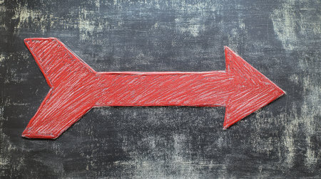 A large red arrow pointing left on a chalkboard-style background, symbolizing a change of direction. The arrow appears handの素材