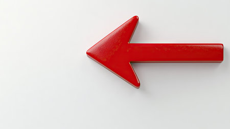 A vibrant red arrow pointing to the left on a clean white background, symbolizing direction or navigation.の素材