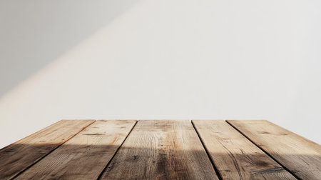A rustic wooden table featuring an exquisite grain texture, set against a bright and clean background. Perfect for interior or product photography.の素材