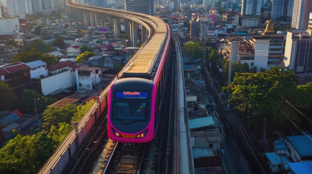 A captivating aerial view of Bangkok's urban sprawl showcasing modern transportation and vibrant architecture, highlighting the dynamic essence of city life.の素材
