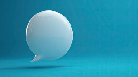Elegant 3D white chat bubble with a bold blue background, representing text messages, communication tools, or social media interactions.の素材